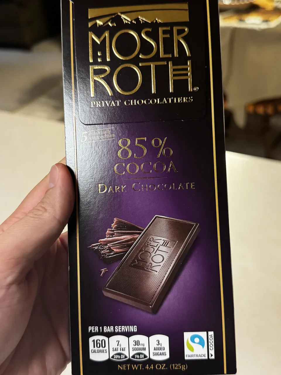the packaging of an 85% cocoa dark chocolate bar made by Moser Roth